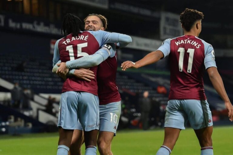 Bertrand Traore shouldering Jack Grealish’s pressure!